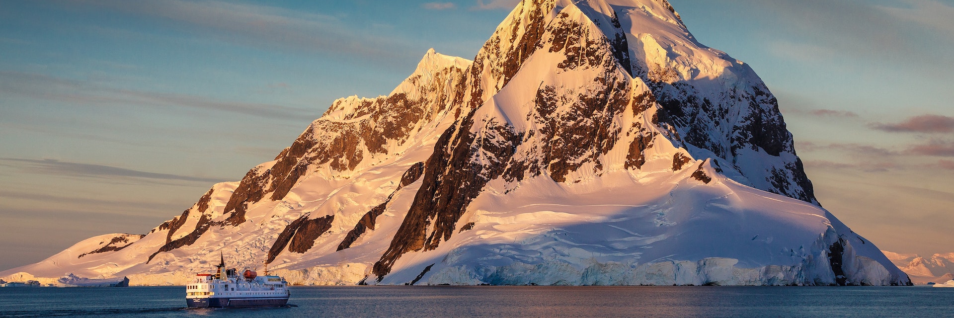 Ship entering the Lemaire Channel, Antarctica.
mountains, winter, boat, cold, travel, blue, clouds, summer, ship, snow, face, canon, mountain, ice, blue sky, peak, photography, slow, cruise, cruising, tall, southern ocean, davidmerronphotography, Antarctica, Sunset, Lemairechannel, Lemaire channel