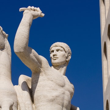 Statue outside Palazzo della Civilita del Lavoro, EUR area.