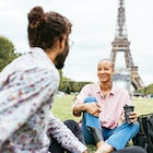 Image of multiracial people in Paris near Eiffel tower