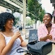 Friends catch up over a drink under the High Line.