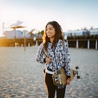 Young mixed Latina woman enjoying the beautiful Santa Monica beach in Los Angeles, California. She is wearing a fashionable spring jacket, going to meet her friends near the beach, holding an old school longboard under her arm.
1133479582
relaxation, only women, one person, beautiful woman, enjoyment, satisfaction, long hair, beauty, 25-29 years, women, horizontal, summer, curly hair, jacket, portrait, city life, fashion, side view, california, lifestyles, outdoors, young women, beautiful people, santa monica, latin american and hispanic ethnicity, venice beach, happiness, fashionable, city of los angeles, latin american culture, cool attitude, walking, mixed race person, los angeles county, real people, candid, street style, retro style, skateboard, tan, surfing, skateboarding, longboard skating, hipster - person, sunset, back lit, beach, pier, toothy smile