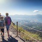 Family walking on the summit of Mount Vesuvius volcano in Campania, Italy. View of the gulf of Naples and the Lattari Mountains...Sunny summer day...Nikon D850
1185673790