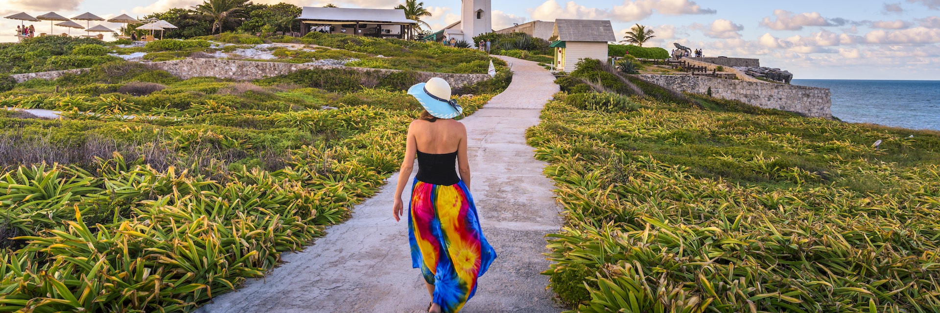 Woman walking in Punta Sur, Isla Mujeres, Mexico