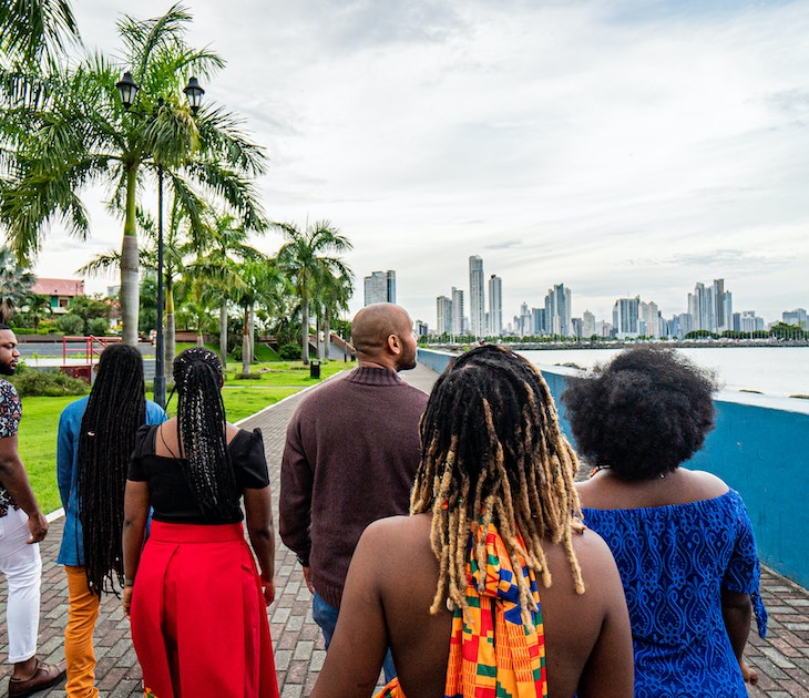 Rear View Following a Group of Cheerful, Fashionable Afro-Descendant Black Tourists Walking Together Taking in a View of Panama City, Panama from Plaza V Centenario with Copy Space
1426692017
A group of travelers on a walking tour of Panama City