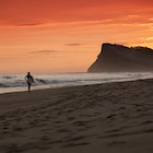 A silhouetted surfer walks down a beach in Nicaragua on sunset during a balmy June afternoon.
181097906
Back Lit, Beach, Carrying, Cloud, Cloudscape, Day, Dusk, Female, Graduated, Hill, Horizontal, Illuminated, Leisure Activity, Mountain, Multi Colored, Nicaragua, Night, One Person, Outdoors, Recreational Pursuit, Reflection, Sand, Sea, Solitude, Summer, Sun, Sunbeam, Sunlight, Surf, Surfboard, Surfing, Travel Destinations, Tropical Climate, Vacations, Walking, Water Sport, Wave, Wave Pattern, Women