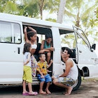 Man with family traveling in van, Playa Bandera, Puntarenas, Costa Rica