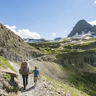 Women and child hiking on the Highline Trail in Glacier National Park, Montana.
740519519
4-5 Years, 25-29 Years, Asian Ethnicity, Boys, Casual Clothing, Enjoyment, Eroded, Footpath, Geology, Glacier National Park, Hiker, Hiking, Holding, Holding Hands, Horizontal, Montana, mountain, outdoors, Panoramic, Real People, Rear View, Recreational Pursuit, rock, Rock Formation, snow, Stone, Sunlight, togetherness, Two people, USA, valley, walking, Young women