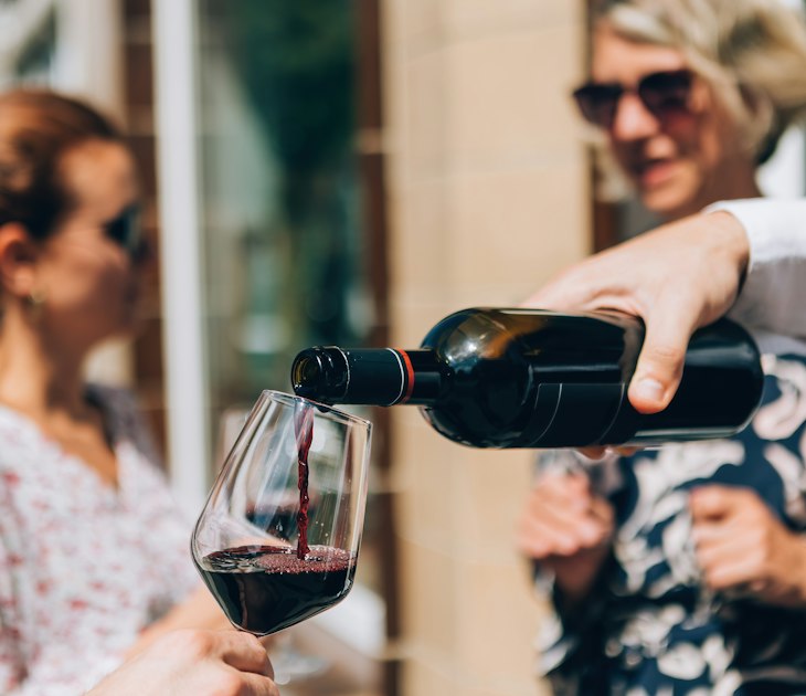 pouring red wine on glass at the aperitif happy hour wine tasting; Shutterstock ID 2182703537; full: 65050; gl: Online Editorial; netsuite: Bordeaux on a budget; your: Bailey Freeman
2182703537