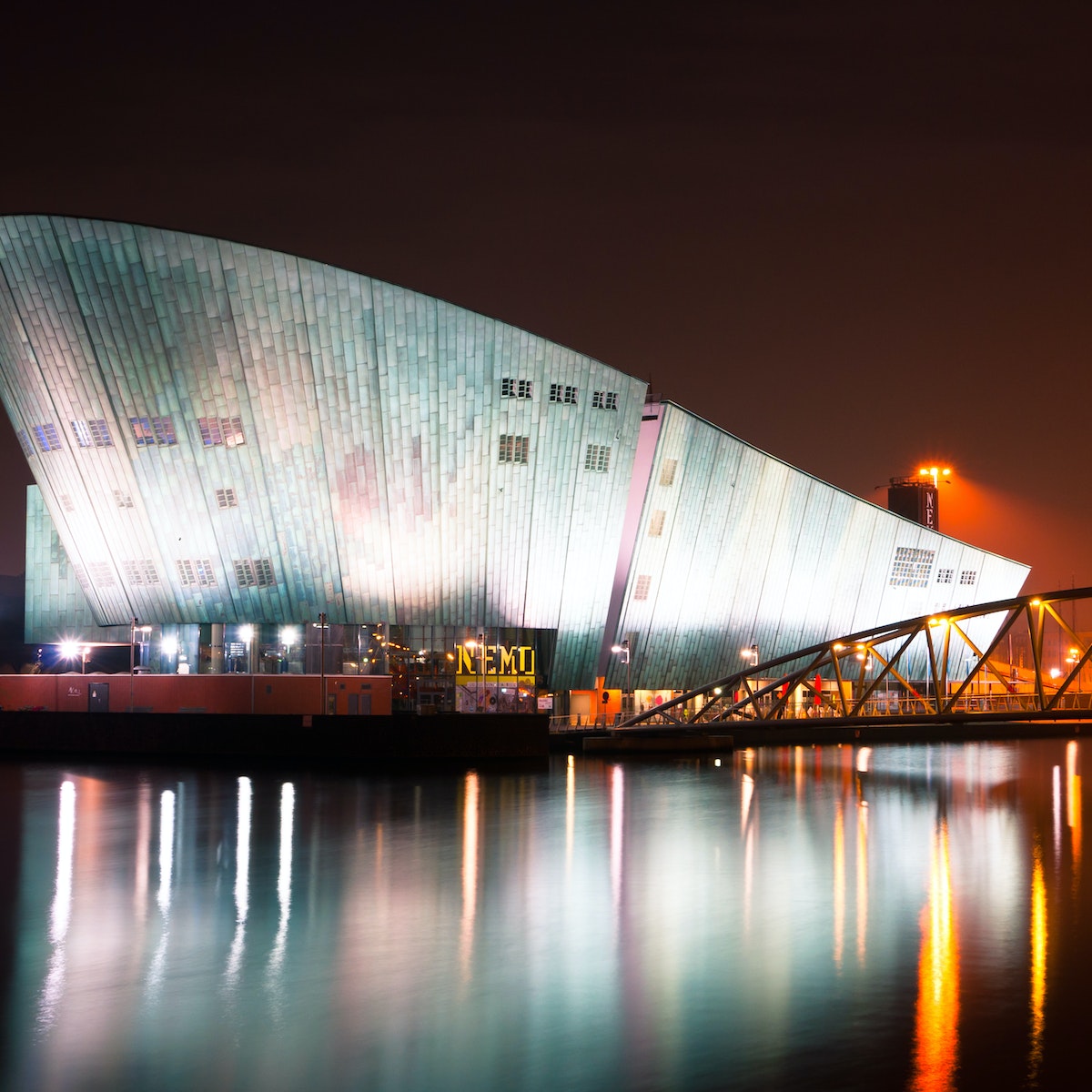 AMSTERDAM, NETHERLANDS - JULY 27: The Nemo Museum at night on July 27, 2013 in Amsterdam, Netherlands. Science Center NEMO is designed by Renzo Piano since 1997.; Shutterstock ID 162619127; Your name (First / Last): Josh Vogel; Project no. or GL code: 56530; Network activity no. or Cost Centre: Online-Design; Product or Project: 65050/7529/Josh Vogel/LP.com Destination Galleries