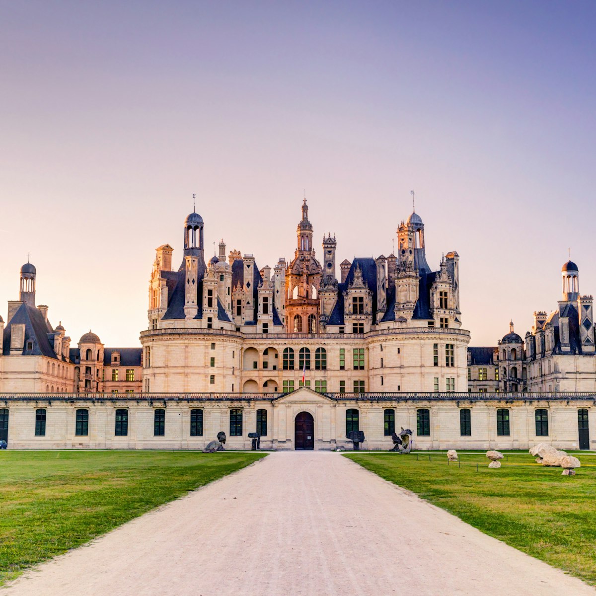 The royal Chateau de Chambord in the evening, France. This castle is located in the Loire Valley, was built in the 16th century and is one of the most recognizable chateaux in the world.